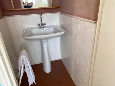 Salle de bains dans l'établissement Le Moulin