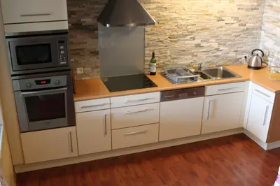 Cuisine ou kitchenette dans l'établissement Port La Houle, Grand Appartement Vue Mer, WIFI