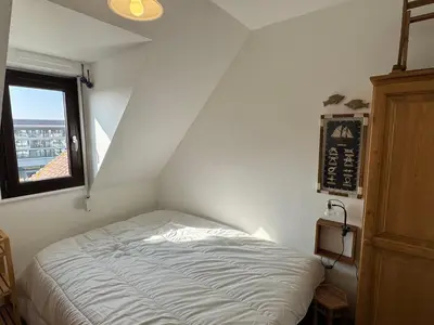 Un ou plusieurs lits dans un hébergement de l'établissement Appartement 2 pièces accès direct plage, animaux acceptés, Wifi - FR-1-487-378