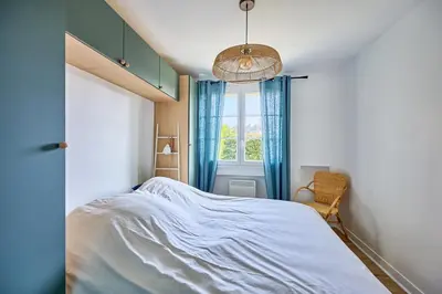 Un ou plusieurs lits dans un hébergement de l'établissement La Parenthèse Normande - Proche Plage