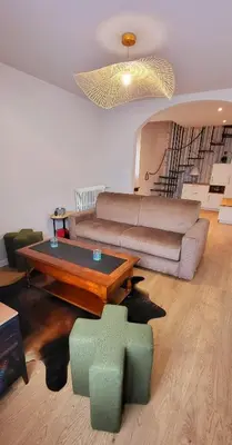 Coin salon dans l'établissement Le Cosy Home
