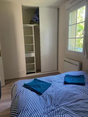 Un ou plusieurs lits dans un hébergement de l'établissement Maison 100m2 avec jardin aux portes de Caen