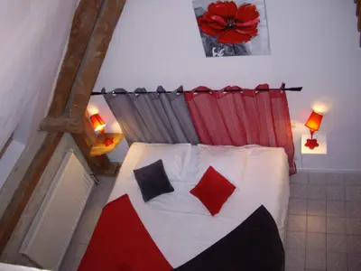 Un ou plusieurs lits dans un hébergement de l'établissement Auberge De La Luzerne