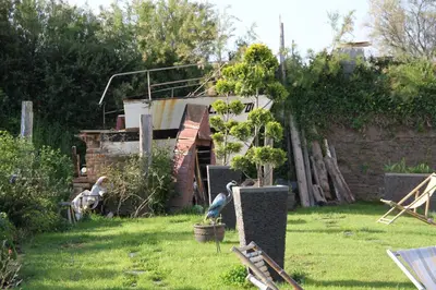 Jardin de l'établissement Chambre double Guernesey dans une maison, au calme sur le GR223