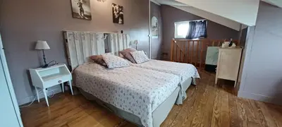Un ou plusieurs lits dans un hébergement de l'établissement Le Pavillon de Chasse
