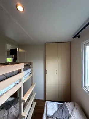 Un ou plusieurs lits dans un hébergement de l'établissement Mobil-home 5 personnes