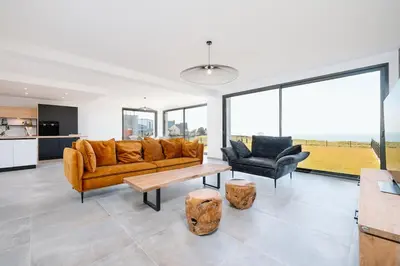 Coin salon dans l'établissement Villa Bellevue