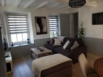 Coin salon dans l'établissement Maison de charme avec terrasse