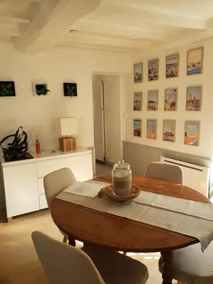 Coin salon dans l'établissement Maison de charme avec terrasse