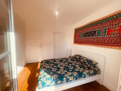 Un ou plusieurs lits dans un hébergement de l'établissement Maharaja - Grande Maison & Terrasse Plage