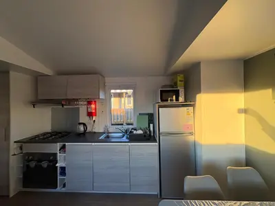 Cuisine ou kitchenette dans l'établissement Home Sweet Home Domaine du Litteau