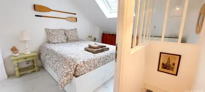 Un ou plusieurs lits dans un hébergement de l'établissement La Coquille Séjour en Duo Confort Maisonnette de bourg à Ouistreham - Situation idéale commerces & plage - Wifi et linge inclus