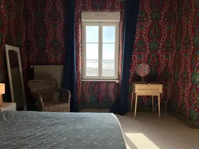 Un ou plusieurs lits dans un hébergement de l'établissement La Colombière - Appartement Villa front de mer