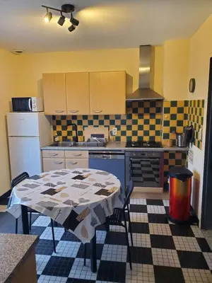 Cuisine ou kitchenette dans l'établissement A l'horizon du Mont