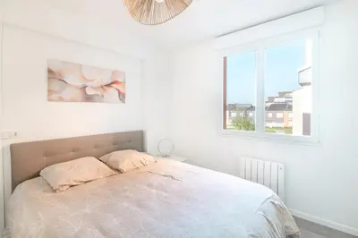 Un ou plusieurs lits dans un hébergement de l'établissement L’Écume de Courseulles - A 2min de la plage