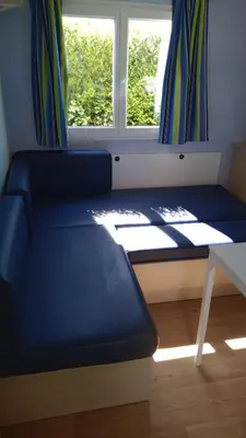 Un ou plusieurs lits dans un hébergement de l'établissement Mobil-home camping 4 étoiles cancale