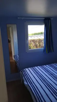 Un ou plusieurs lits dans un hébergement de l'établissement Mobil-home camping 4 étoiles cancale