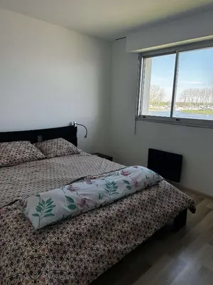Un ou plusieurs lits dans un hébergement de l'établissement Le phare du canal, jardin privé
