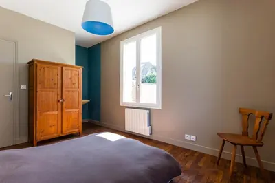 Un ou plusieurs lits dans un hébergement de l'établissement Superb beach-front family house