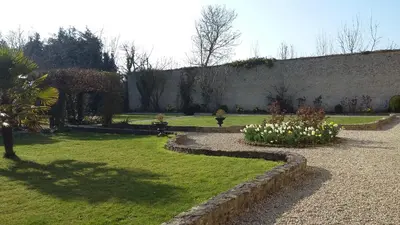 Jardin de l'établissement Victoria Arromanches B&B