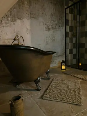 Salle de bains dans l'établissement Le Ranch Normand