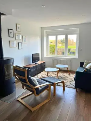 Coin salon dans l'établissement Maison familiale proche de la mer