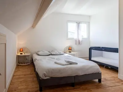 Un ou plusieurs lits dans un hébergement de l'établissement Holiday Home La maison du phare by Interhome