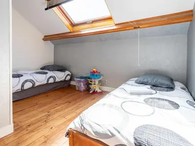 Un ou plusieurs lits dans un hébergement de l'établissement Holiday Home La maison du phare by Interhome