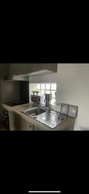 Cuisine ou kitchenette dans l'établissement Appartement bord de mer