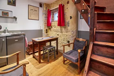 Coin salon dans l'établissement La Plus Petite Maison De France