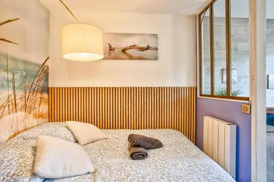 Un ou plusieurs lits dans un hébergement de l'établissement Les Dunes - Jardin Privatif - Plage à 500 Mètres
