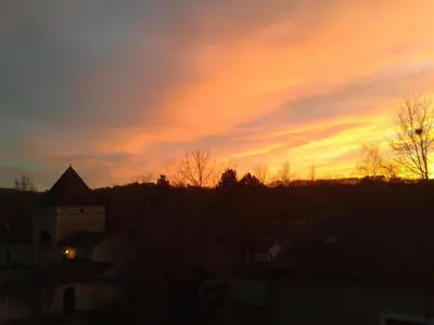 Lever ou coucher de soleil vu de la maison de vacances ou à proximité