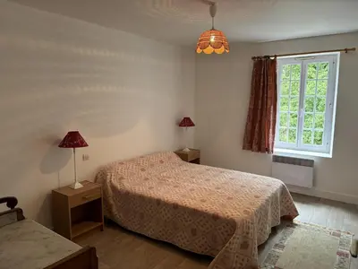 Un ou plusieurs lits dans un hébergement de l'établissement Normandy Family Escape