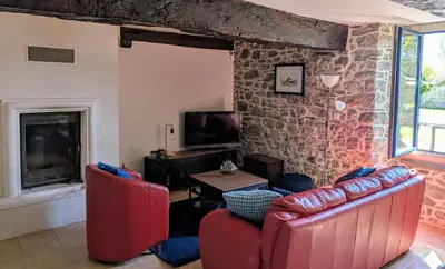 Coin salon dans l'établissement La Barbotierre 10 Personnes en bord de mer