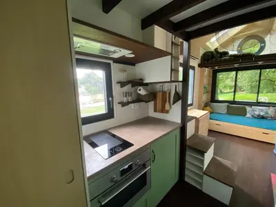 Cuisine ou kitchenette dans l'établissement Tiny house des cyclamens St André sur Orne