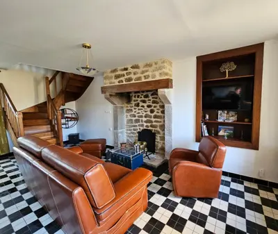 Coin salon dans l'établissement Gîte les 13 lavoirs d'antan