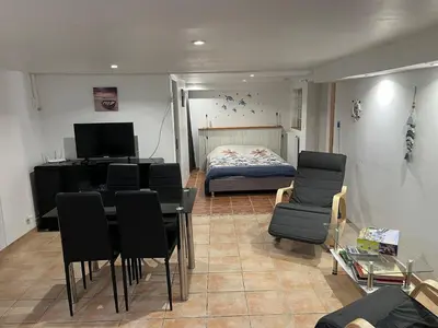 Un ou plusieurs lits dans un hébergement de l'établissement studio bord de mer