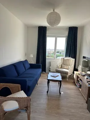 Coin salon dans l'établissement Maison face à la mer