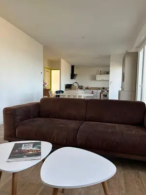 Coin salon dans l'établissement Maison face à la mer