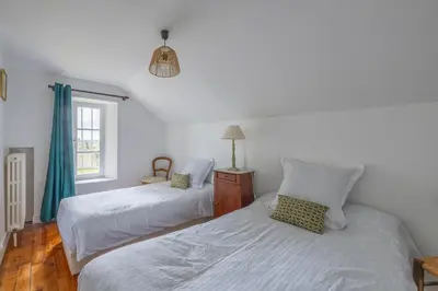 Un ou plusieurs lits dans un hébergement de l'établissement Le Cottage de Marguerite
