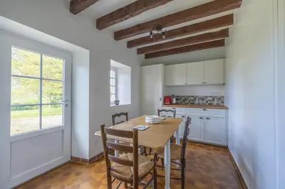 Cuisine ou kitchenette dans l'établissement Le Cottage de Marguerite