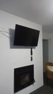 Télévision ou salle de divertissement dans l'établissement maison de famille