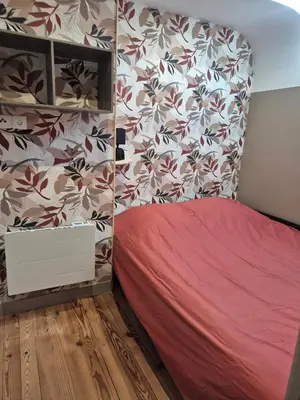 Un ou plusieurs lits dans un hébergement de l'établissement Jolie maison de campagne avec spa en option