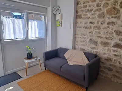 Coin salon dans l'établissement appartement centre ville