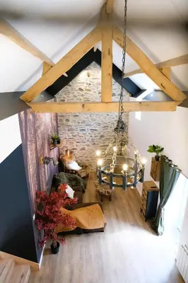 Coin salon dans l'établissement Maison de vacances avec SPA