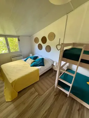 Un ou plusieurs lits dans un hébergement de l'établissement L echo des pins, plage à pied