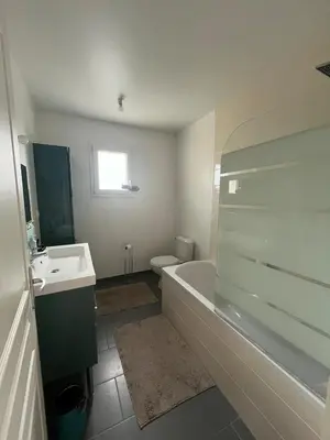 Salle de bains dans l'établissement La P'tite Huguette