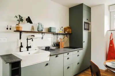 Cuisine ou kitchenette dans l'établissement La Baie - Appartement de charme entièrement équipé à 5min du Mont St Michel