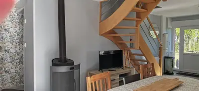 Télévision ou salle de divertissement dans l'établissement Maison La Petite Boulangerie