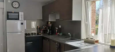 Cuisine ou kitchenette dans l'établissement Maison La Petite Boulangerie